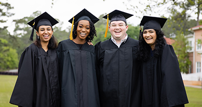 group of students in cap and gowns