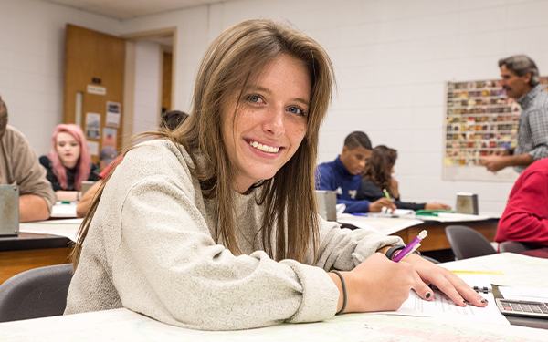 Student Completing Course Work