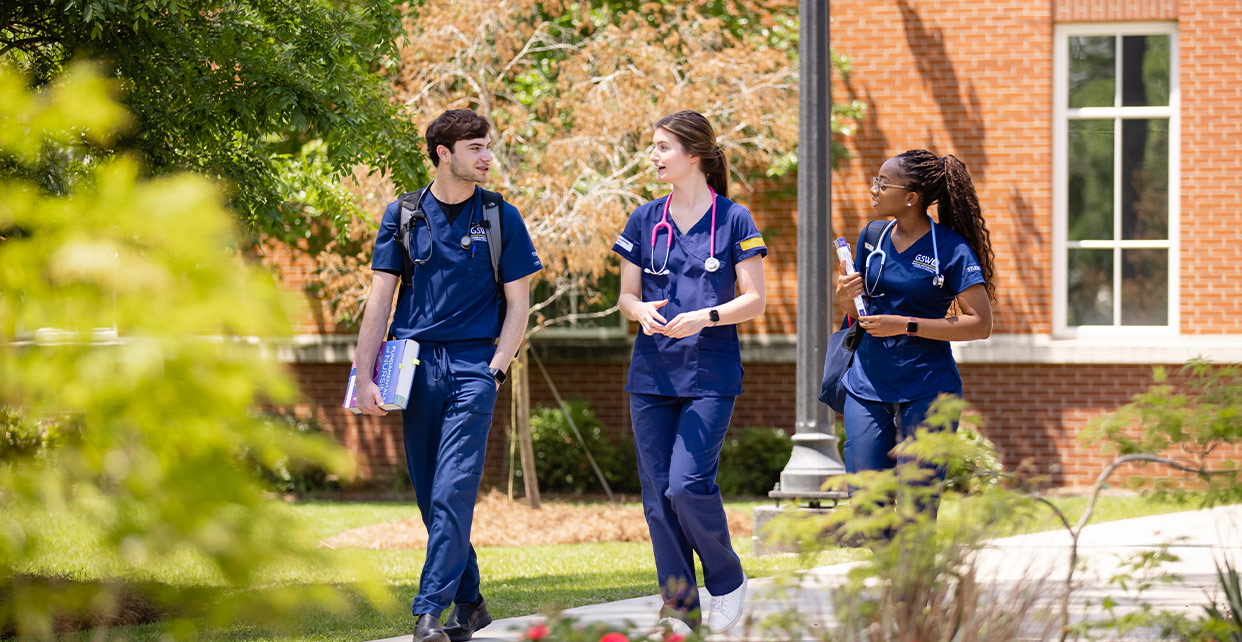 nursing students walking on campus