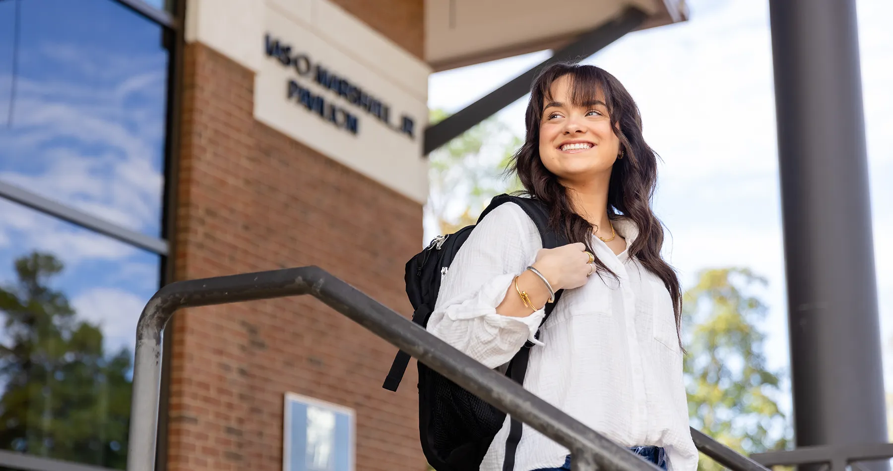 Student applying for scholarships on laptop