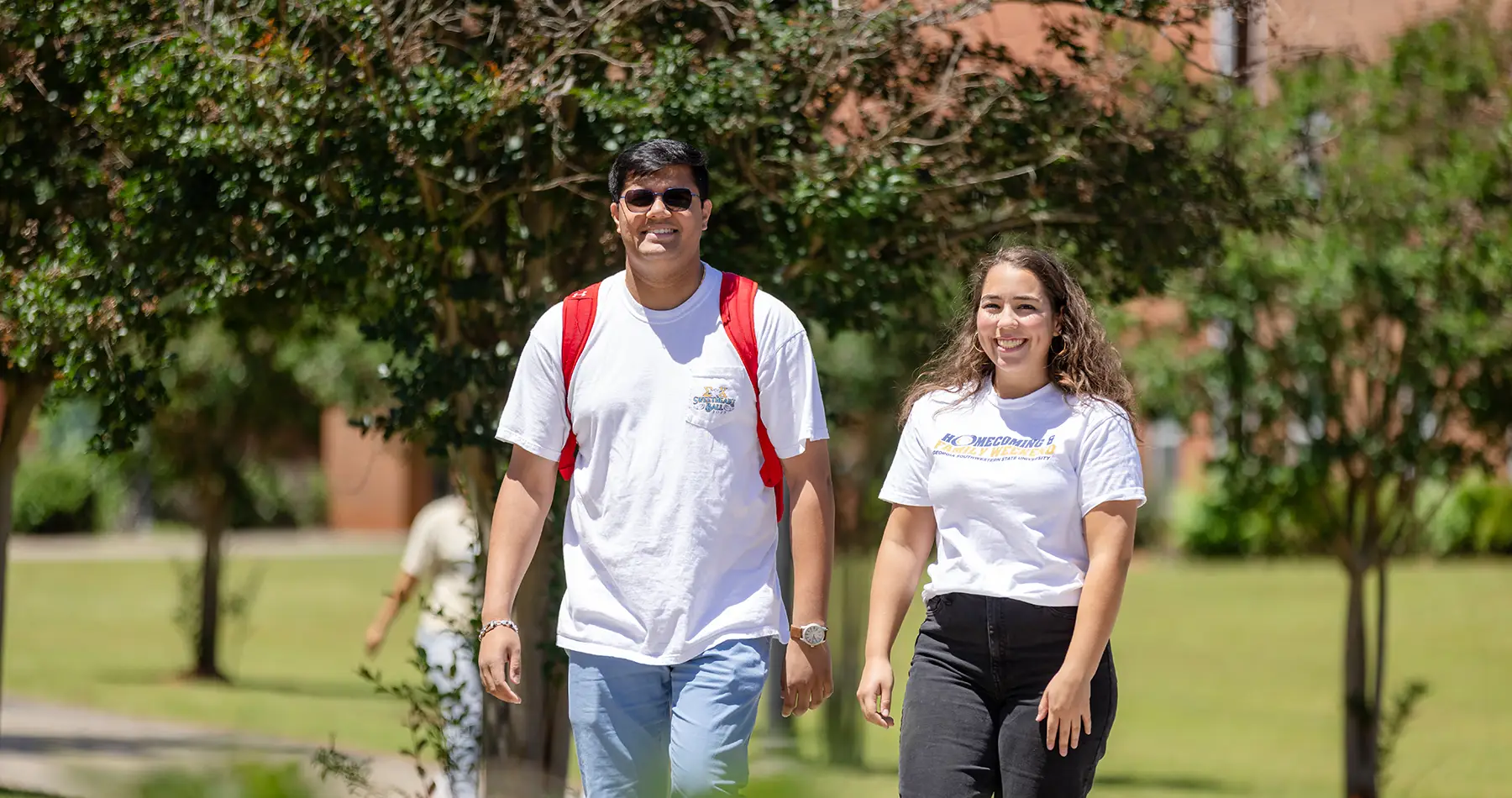 Students walking outside on campus