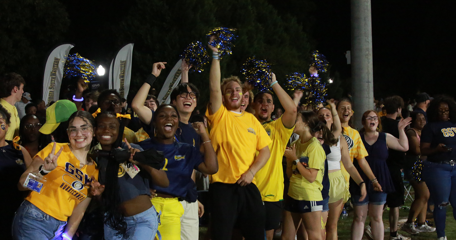 Students cheering at soccer game