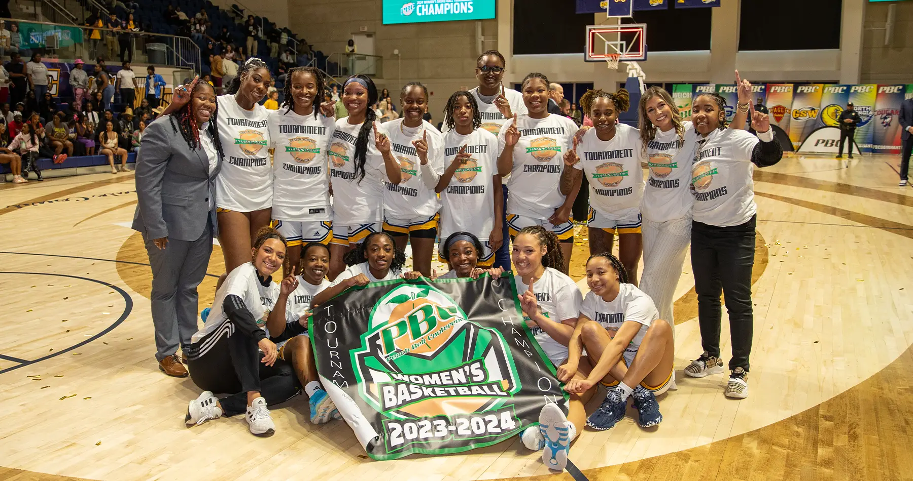 Women's Basketball team with PBC trophy