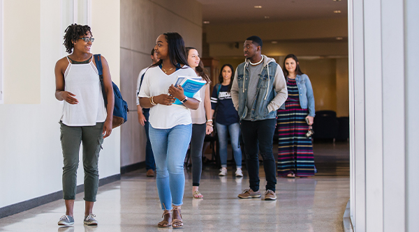 Students Walking in Hallway