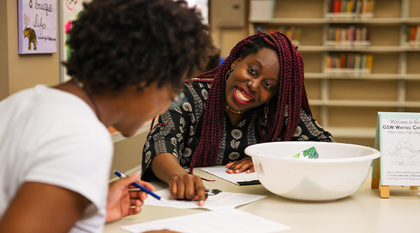 student receiving writing assistance