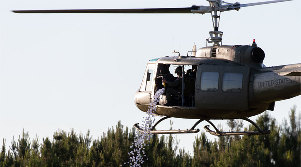 Helicopter dropping golf balls