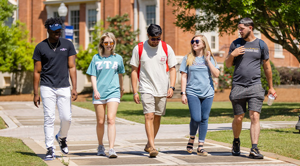 Group of students walking on campus