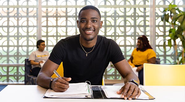 Student with notebook