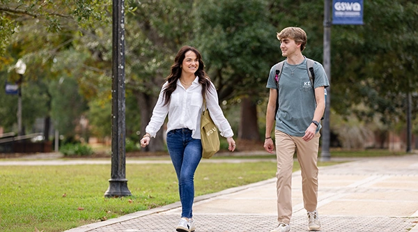Students walking on sidewalk at GSW