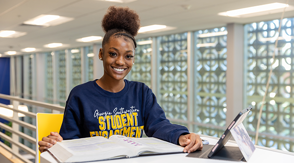 Student studying in Canes Central
