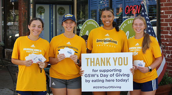 Athletics girls helping with Day of Giving