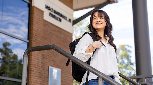 Student on steps at MSC building