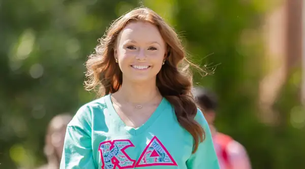 GSW student walking across campus