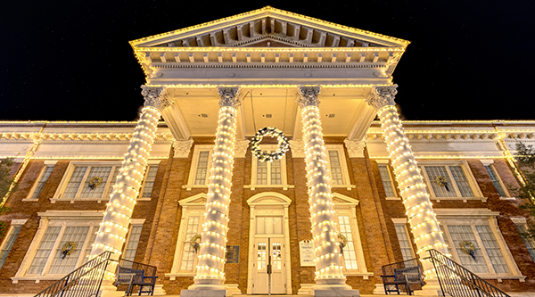 Admin building lit up with Christmas lights