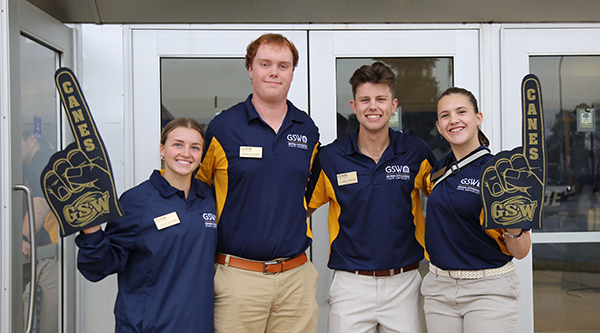 Students posting with GSW merch at Preview Day