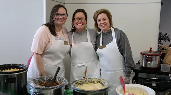 Nursing faculty serving soup