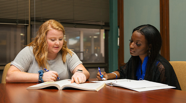 student tutoring another student