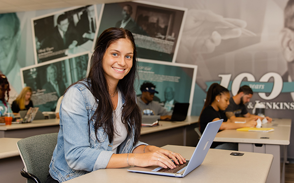 Business student on laptop