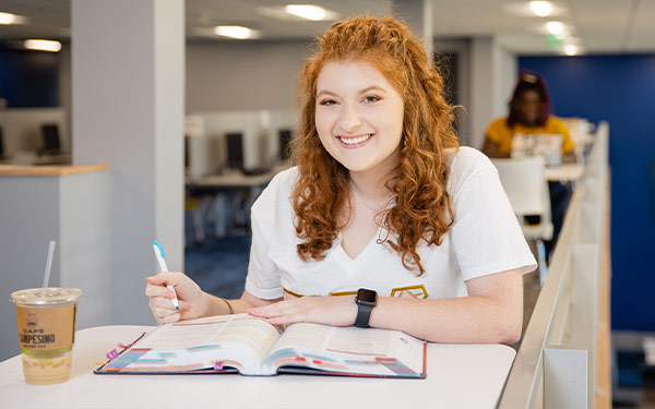 Student studying in Canes Central