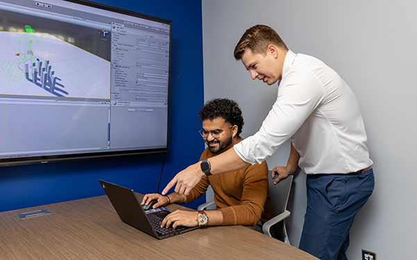Student being instructed by a professor