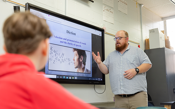 Middle grades teacher giving a presentation