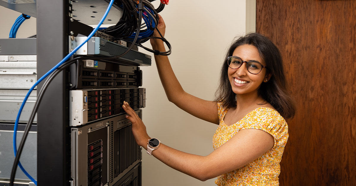 computer science student working with server