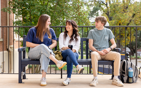 Students Talking on bench