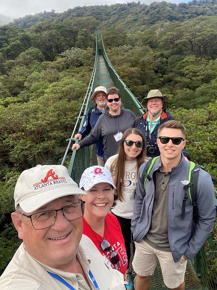 Alumni and friends cross the Hanging Bridges in Monteverde while traveling to Costa Rica