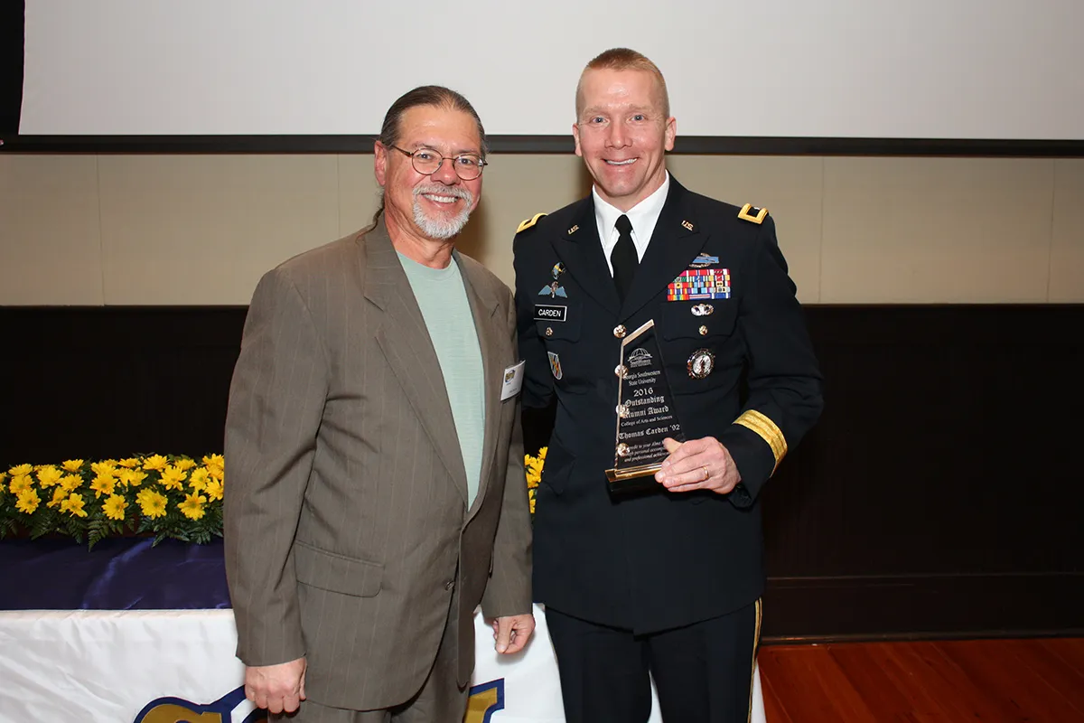 General Carden receiving Outstanding Alumni Award