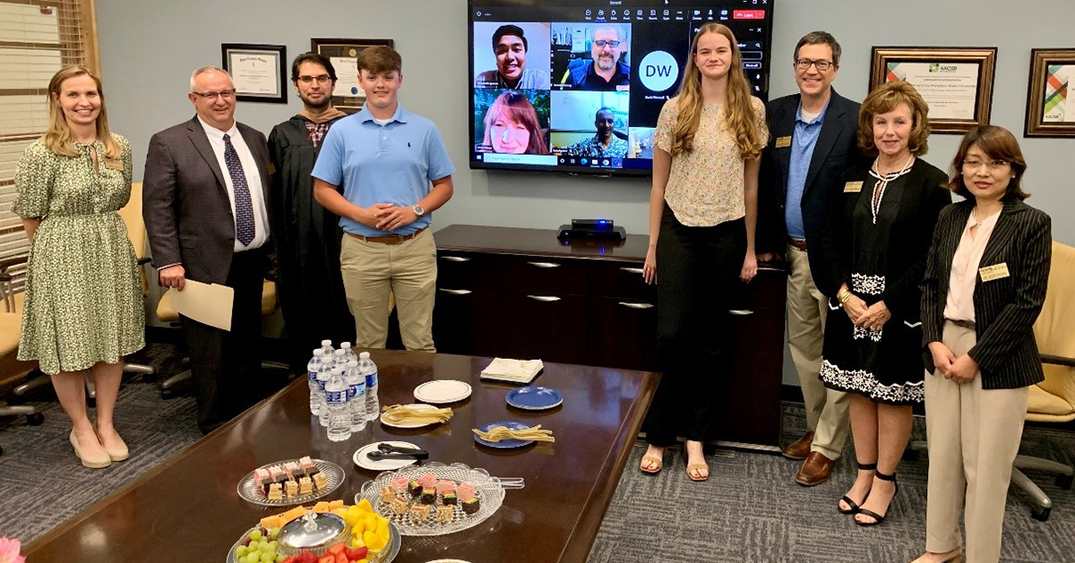 faculty and students at reception