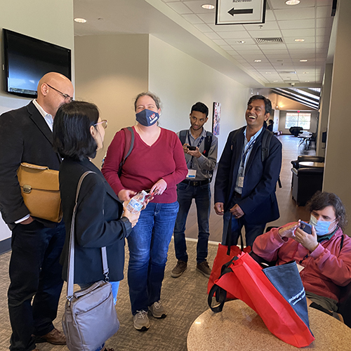 students and faculty at conference