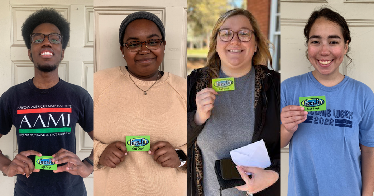 students hold their gas cards