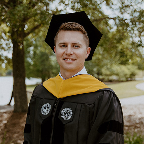 Jonathan Hobbs in doctoral regalia