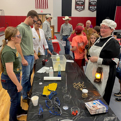 students do experiments in gym