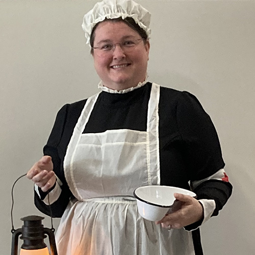 nursing faculty member dressed as Florence Nightingale