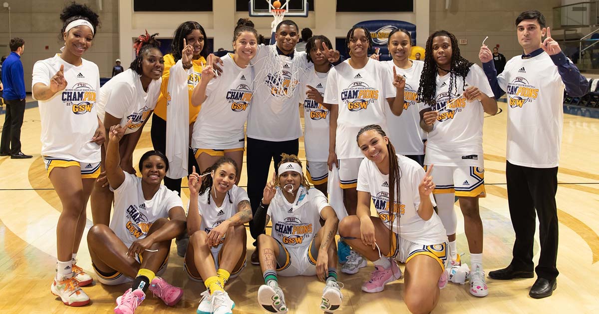 women's basketball team celebreates win