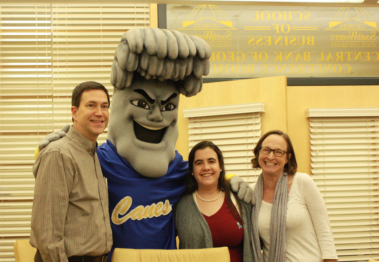 Grimes with Surge and students