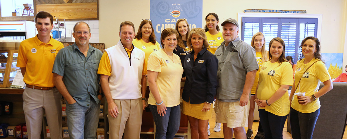 staff wear gold on Day of Giving