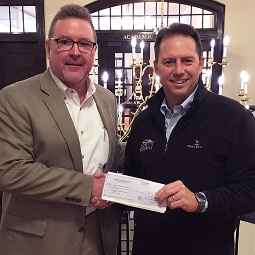 Don Porter and Neal Weaver hold check