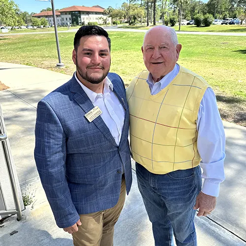 Alex Espitia and Chancellor Sonny Purdue