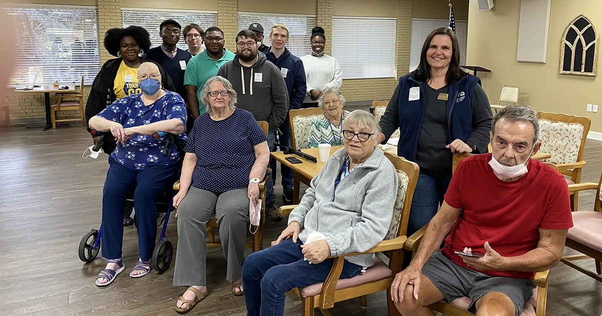 students with senior residents of Magnolia Manor