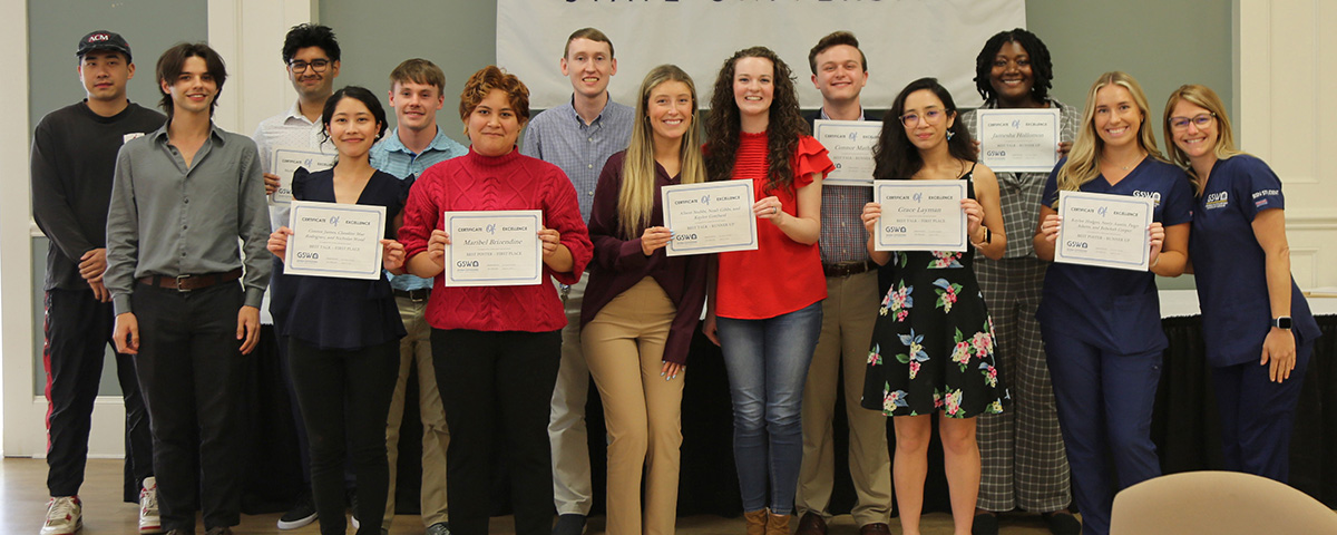 student winners with certificates