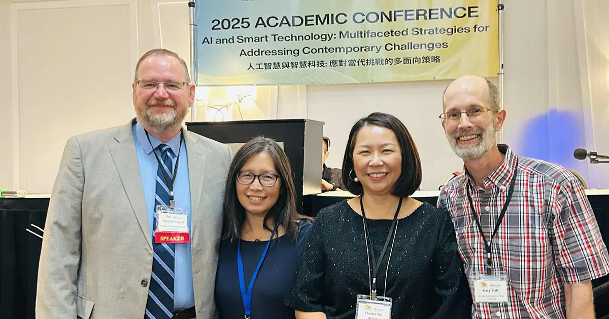 faculty at conference