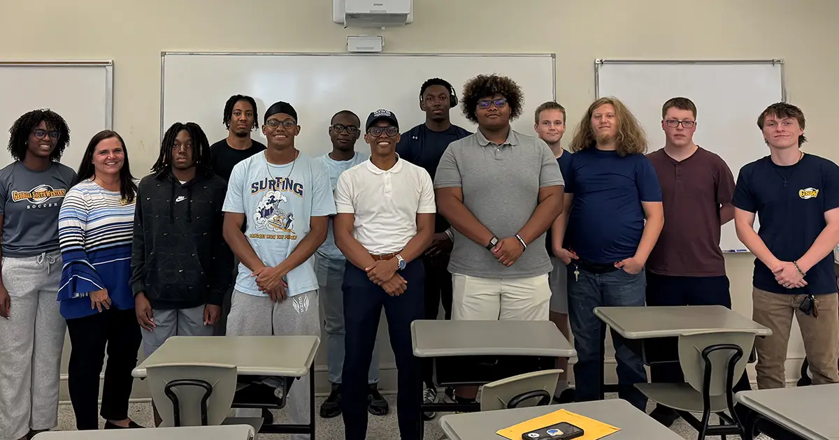 Sid Walker with group of students