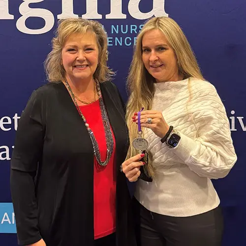 Teasley and Dykes with award