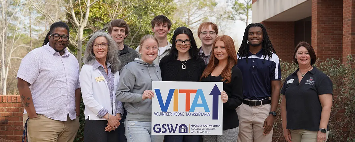 accounting students pose with VITA sign