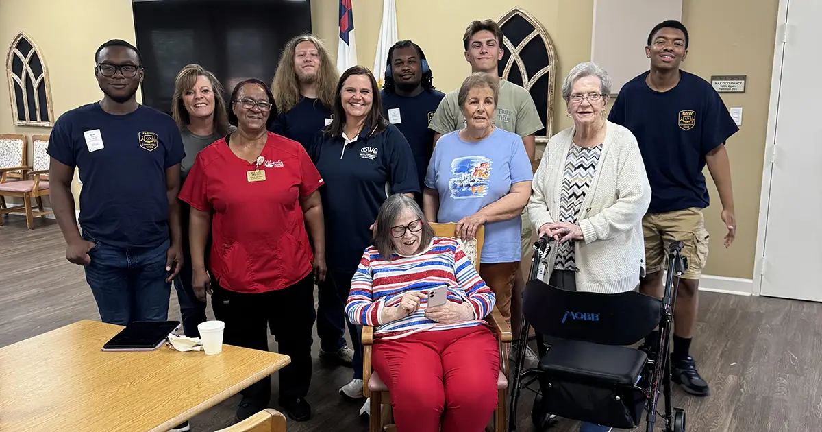 group of students with Manor residents