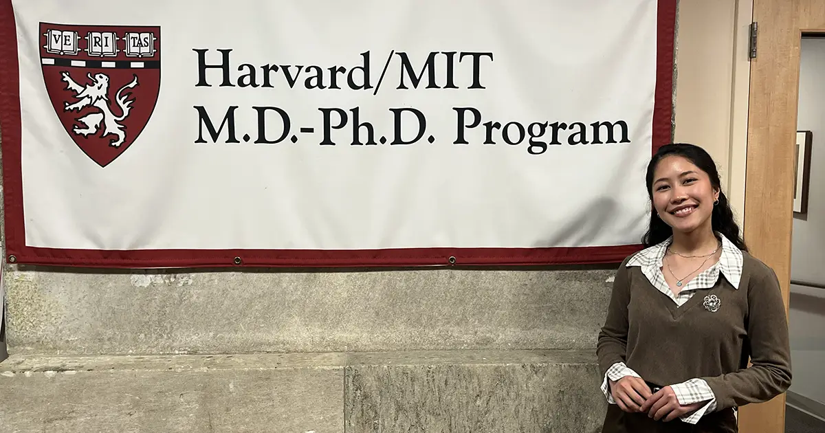Clae in front for Harvard sign