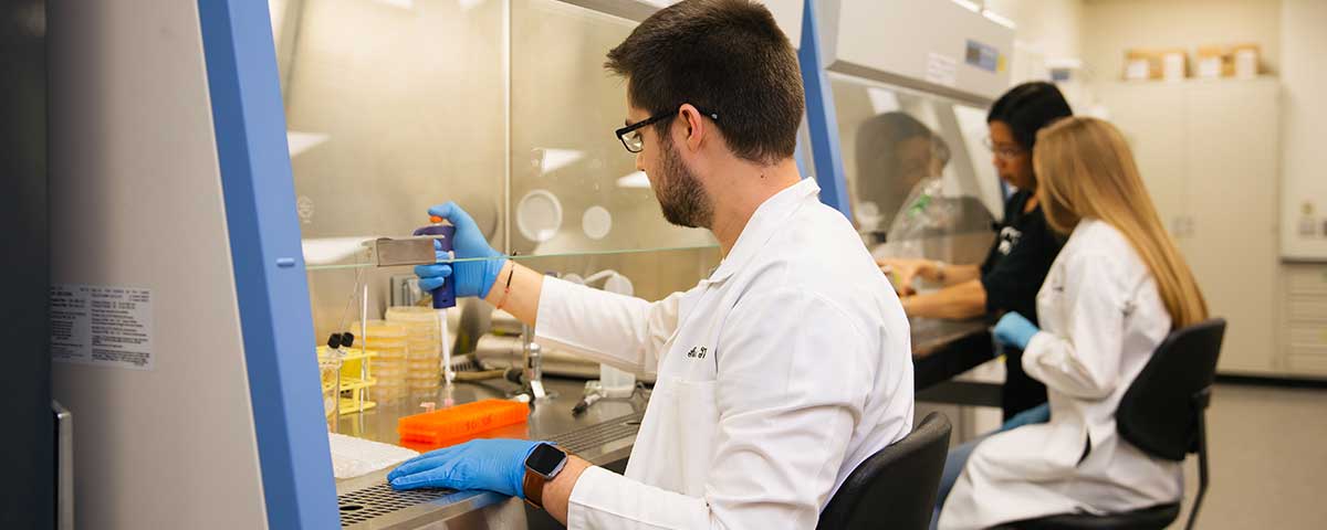 student working in science lab