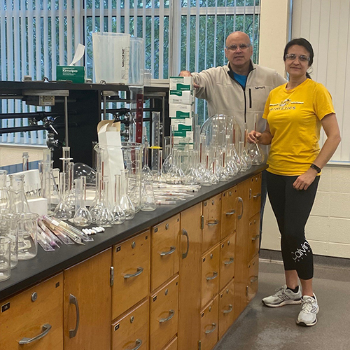 professors with new lab glassware